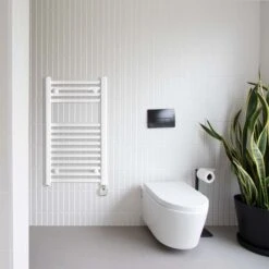 Ecostrad Fina-E Thermostatic Electric Towel Rail - White -Electric Radiators Direct fina e white 150w thermostatic lifestyle 1